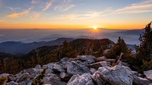 beautiful sunset on top of a rocky mountain