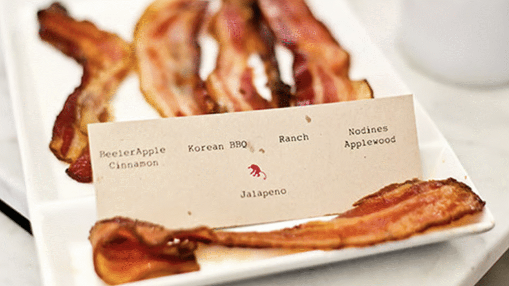 bacon served on a long platter with menu note