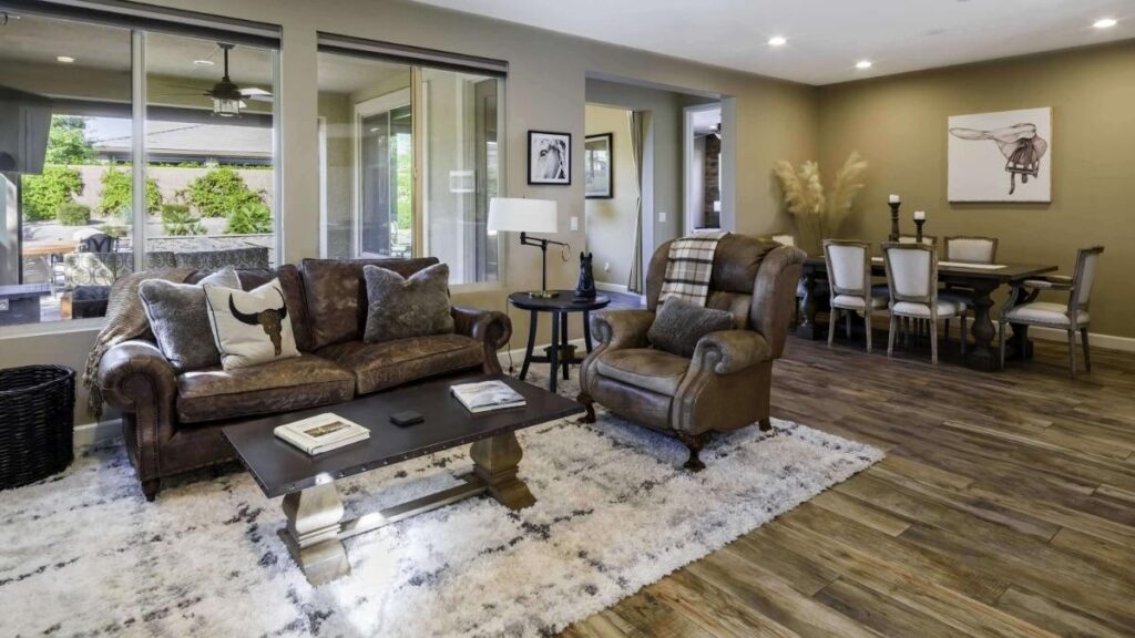 luxurious wooden floor living room with brown leather sofas