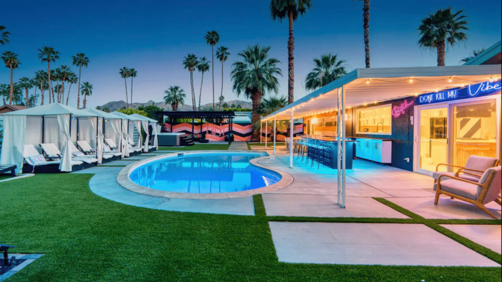 beautiful poolhouse with boolside beds for relaxation