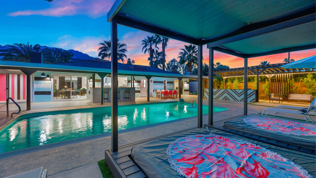 poolside bed in luxury palm springs home